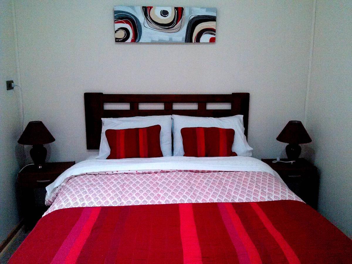 Hotel Genova Los Andes Rum bild